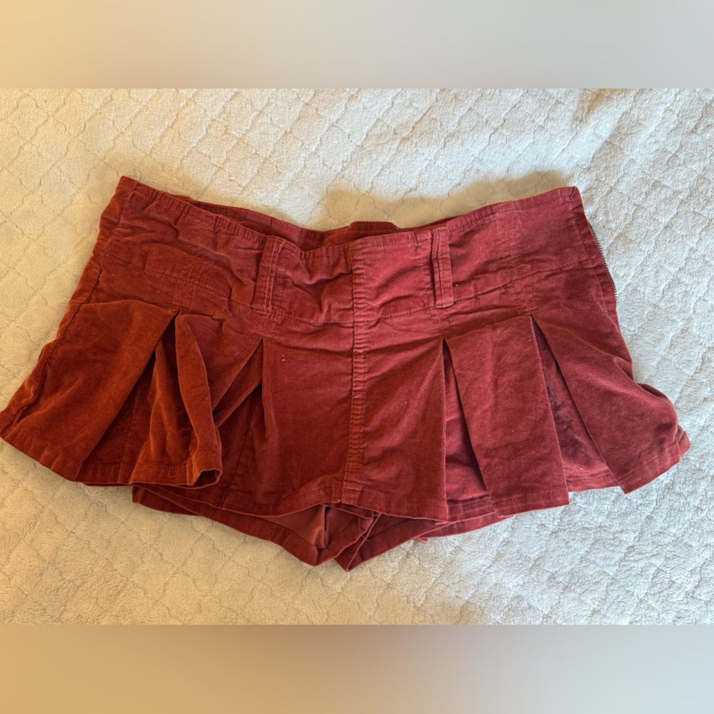 Micro mini skort; Pleated, corduroy; Size: 4; Rust color; Worn once; Free People